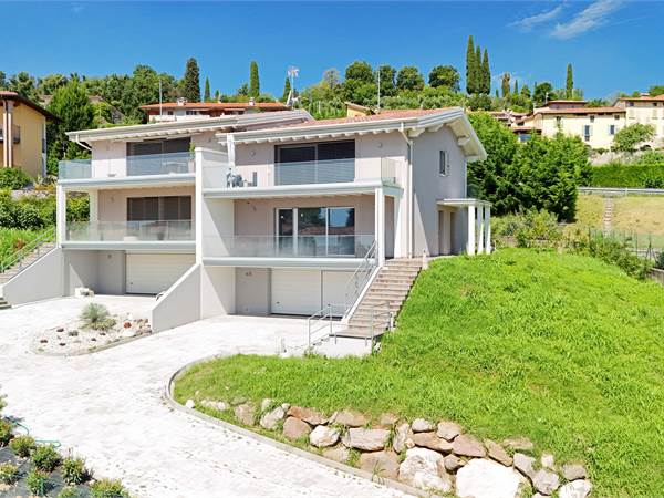 Nuovo Bilocale con Grande Terrazza e Autorimessa